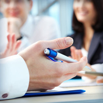 An image of a group meeting / a discussion.