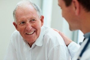 A dentist consulting with dental patient about nitrous oxide.