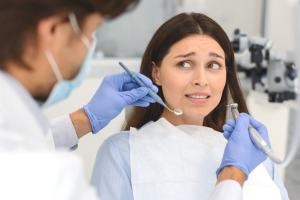 Woman with dental anxiety at the dentist